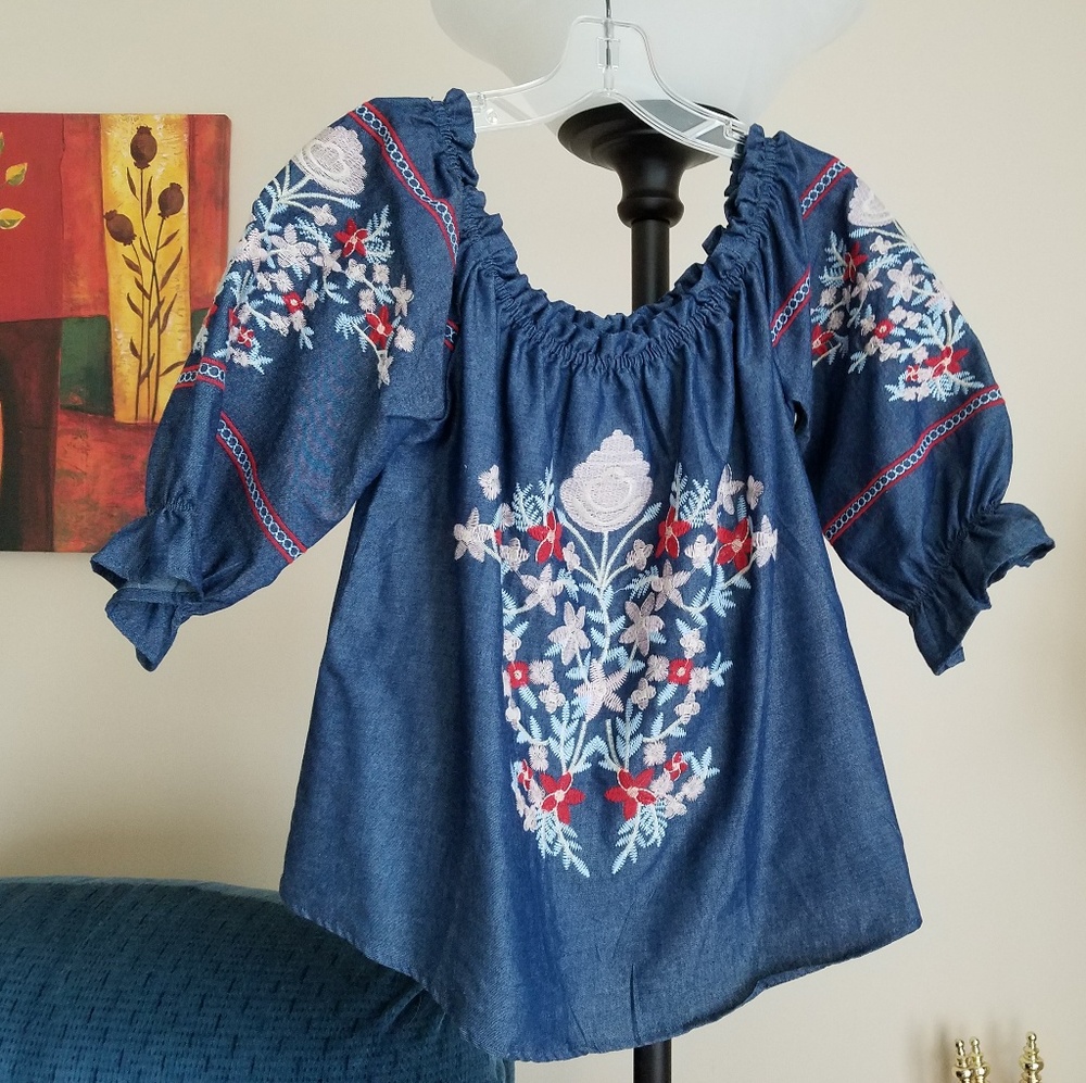 Never worn denim top with embroidery